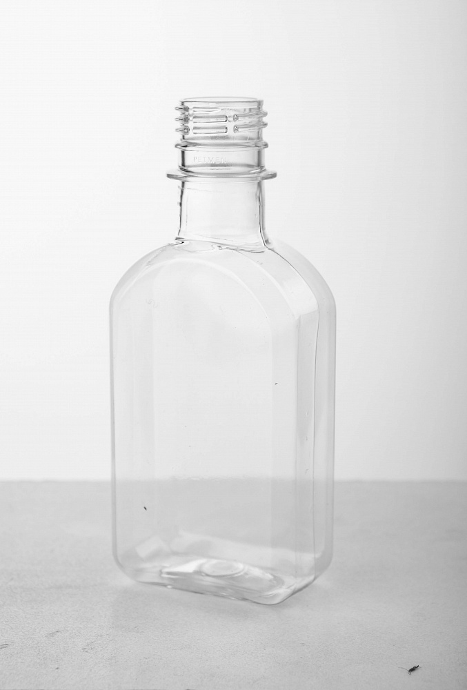 Пластиковая (ПЭТ) Бутылка плоская 200 мл -  оптом или в розницу .